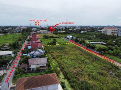 For SaleLandPhutthamonthon, Salaya : Land for sale along Khlong Thawi Watthana, 9 rai, near Bangkok Thonburi University.