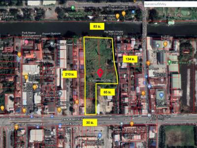 For SaleLandLadkrabang, Suwannaphum Airport : Land for sale, opposite to Suvarnabhumi Market, 8 rai 3 ngan, 77.5 sq wa, next to Lat Krabang Road. suitable for allocating projects