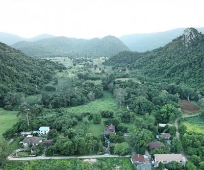 For SaleLandPak Chong KhaoYai : Land for sale in Khao Yai, Mu Si Subdistrict, Pak Chong District, 12 rai 2 ngan 54 square wa, land next to a canal, surrounded by mountains, very beautiful view.