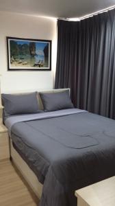 For RentCondoPattaya, Bangsaen, Chonburi : The Grass Condominium South Pattaya Condo for rent On South Pattaya Road.  surrounded many restaurants and shops and transportation service in front of the condo.