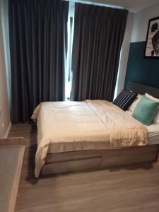 For RentCondoPathum Thani,Rangsit, Thammasat : Urgent rent!! Very good price, very beautiful decorated room, D condo Hideaway Rangsit