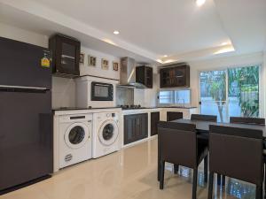 For RentCondoMin Buri, Romklao : Sammakorn Village Ramkhamhaeng | Modern 2 Bed Apartment with Patio