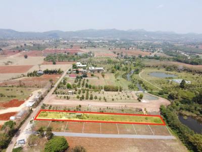 For SaleLandPak Chong KhaoYai : Land for sale in Khao Yai, Moo Si Subdistrict, Pak Chong District, 2 rai 2 ngan 67 square wa next to a canal with a small house with water flowing through the year.