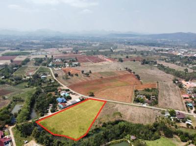 For SaleLandPak Chong KhaoYai : Land for sale in Khao Yai, Moo Si Subdistrict, Pak Chong District, 8 rai next to a canal with water flowing through the year.