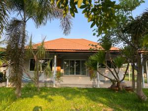For SaleHouseBuri Ram : Beautiful garden house decorated in modern style, 3 bedrooms, 2 bathrooms, 142 sq m., with European kitchen both indoor and outdoor, and land 381 sq m.