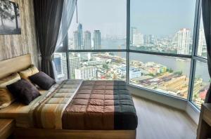 For RentCondoSathorn, Narathiwat : urgent! Beautiful room, view of the curve of the Chao Phraya River, Rhythm Sathorn, has a washing machine, fully furnished, ready to move in, contact 092-2424-789.