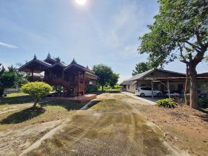 For SaleHousePhitsanulok : House for sale with land, area 2 rai 91.2 sq m., 2 houses, 1 multi-purpose greenhouse and swimming pool, second house 2,300,000.- ready to transfer.