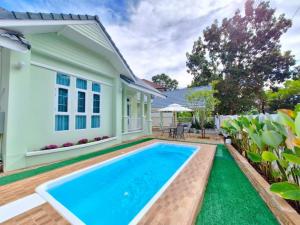 For SaleHouseChiang Mai : Newly renovated House with Swimming Pool for Sale in the project near Kad Farang Hang Dong