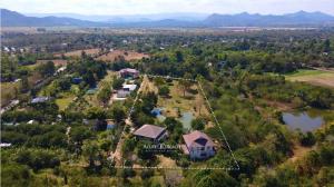 For SaleLandPak Chong KhaoYai : Land with Villa for sale Pak Chong District, Nakhon Ratchasima, next to the Lam Ta Khlong river.