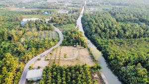 For SaleLandSamut Songkhram : Land in Samut Songkhram, next to Nang Takians water canal, suitable for a resort or homestay, special price reduced from 4.5 million per rai to only about 3.4 million per rai.