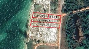 For SaleLandTrat : Empty land for sale, next to the sea, size 929 sq m, Mai Rut Beach, Khlong Yai, Trat.