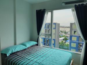 For RentCondoVipawadee, Don Mueang, Lak Si : HCDT102 Happy Condo Don Mueang The Terminal, 8th floor, city view, 24 sq m. Studio with sliding door separating the room, 1 bedroom, 1 bathroom, 7,000 baht. 099-251-6615