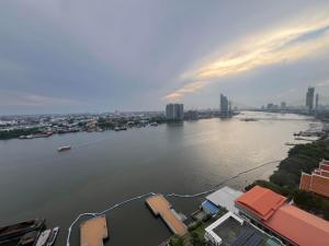 For SaleCondoRama3 (Riverside),Satupadit : Urgent sale🔥🔥: Lumpini condo next to the river, area 104 sq m, 3 bedrooms, 2 bathrooms, with walk in closet, room never rented out, Lumpini Park Rama 3-Riverside.