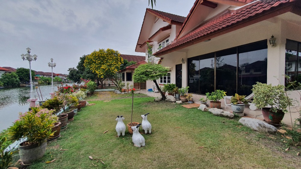 For SaleHousePathum Thani,Rangsit, Thammasat : Single house for sale on the waterfront, ready to move in, Thararin Village, Rangsit, Khlong 2, Lam Luk Ka, Pathum Thani.