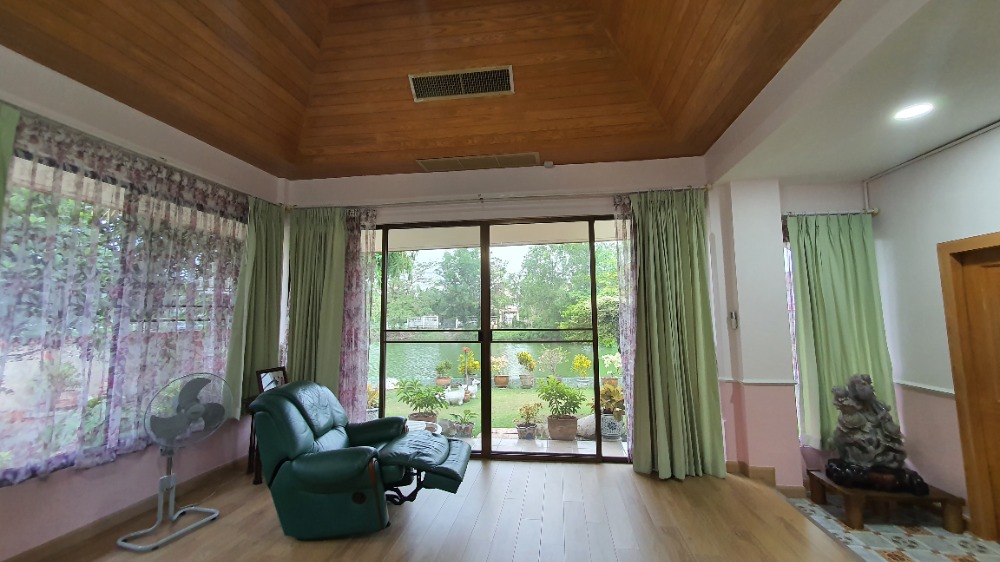 For SaleHousePathum Thani,Rangsit, Thammasat : Single house for sale on the waterfront, ready to move in, Thararin Village, Rangsit, Khlong 2, Lam Luk Ka, Pathum Thani.