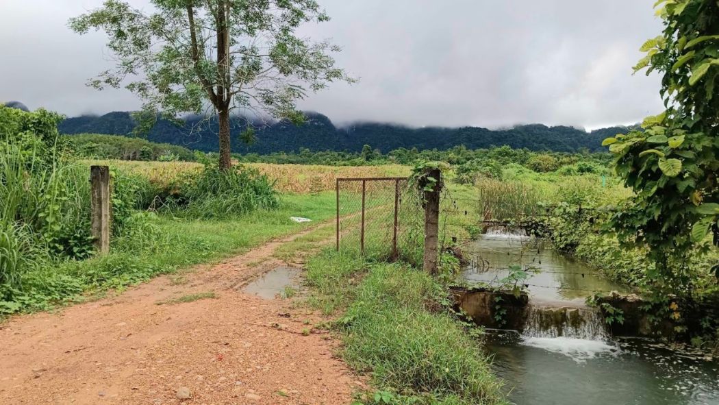 For SaleLandKanchanaburi : Land for sale, Ban Rai Ing Than, 54 rai 240 sq m, has a water stream in the plot, next to a paved road, Lin Thin, Thong Pha Phum.