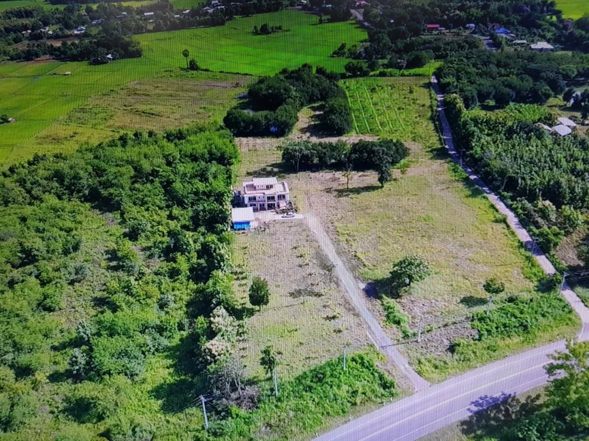 For SaleLandPhetchabun : (Accepting cattle) Selling a large beautiful plot of land, corner plot, on the road, 31 rai, Phetchabun Province (way up to Khao Kho)