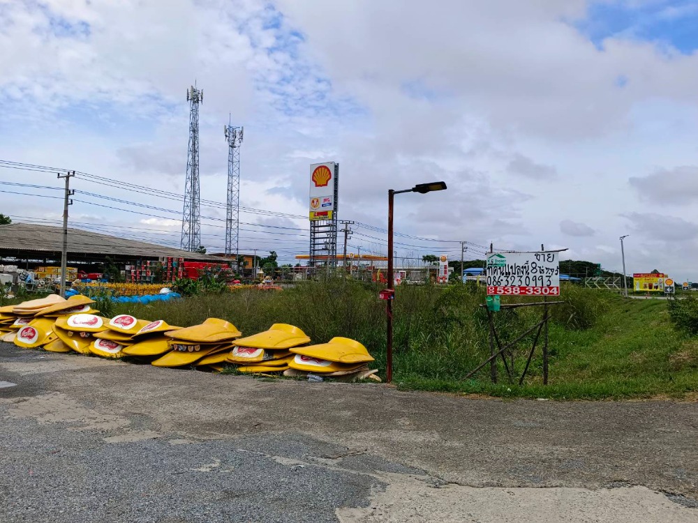 For SaleLandSing Buri : Land for sale, 8 rai, Asia Road, Km. 68.5, next to Shell gas station, Phrom Buri, Sing Buri Province
