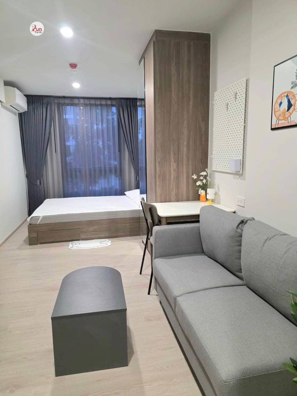 For RentCondoPathum Thani,Rangsit, Thammasat : 🔥Pun for rent New Cross Kookot Station, modern style condo, built-in decoration. Near BTS Kookot Station.