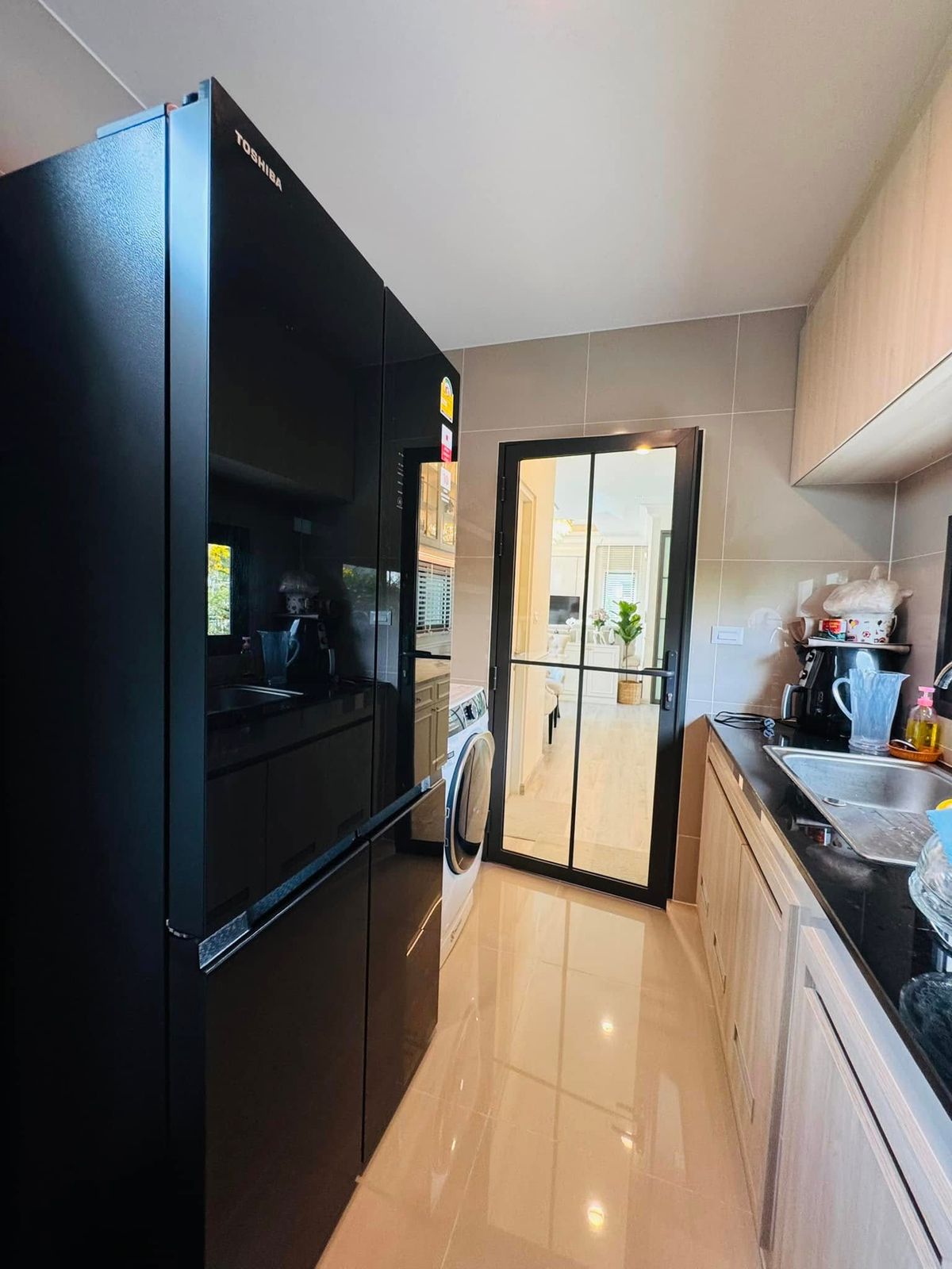 ขายบ้านลาดกระบัง สุวรรณภูมิ : ขายบ้านเดี่ยว 2 ชั้น สราญสิริ รามคำแหง Sanransiri Ramkhamhaeng บ้านสไตล์ Modern Farmhouse แปลงหน้าสวนของโครงการ ที่ตั้ง ถนนเคหะร่มเกล้า คลองสองต้นนุ่น แขวงคลองสองต้นนุ่น เขตลาดกระบัง กรุงเทพฯ 10520 แบบบ้าน ASTER (ขนาดกลางของโครงการ) เนื้อที่ 56.6 ตร.ว.