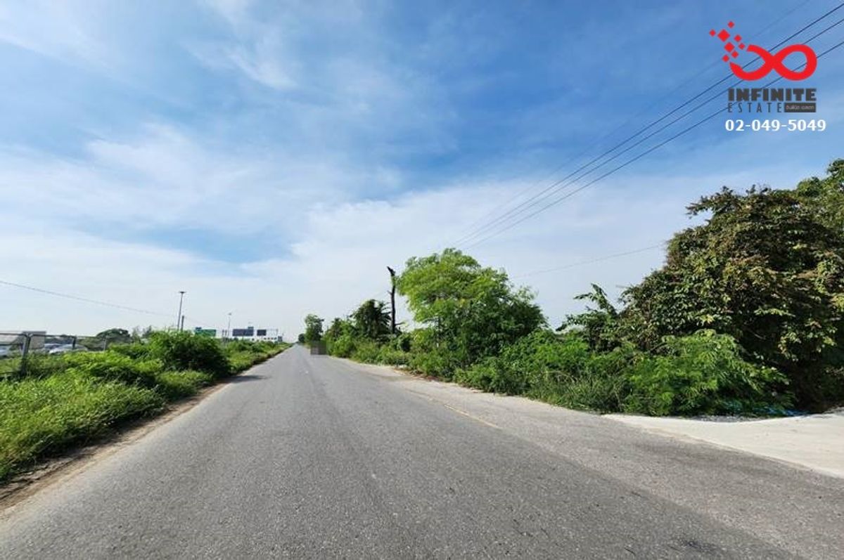 For SaleLandPathum Thani,Rangsit, Thammasat : Selling 2 rai of land, 3 ngan 67 square wah, along the motorway (Khlong 4), Pathum Thani