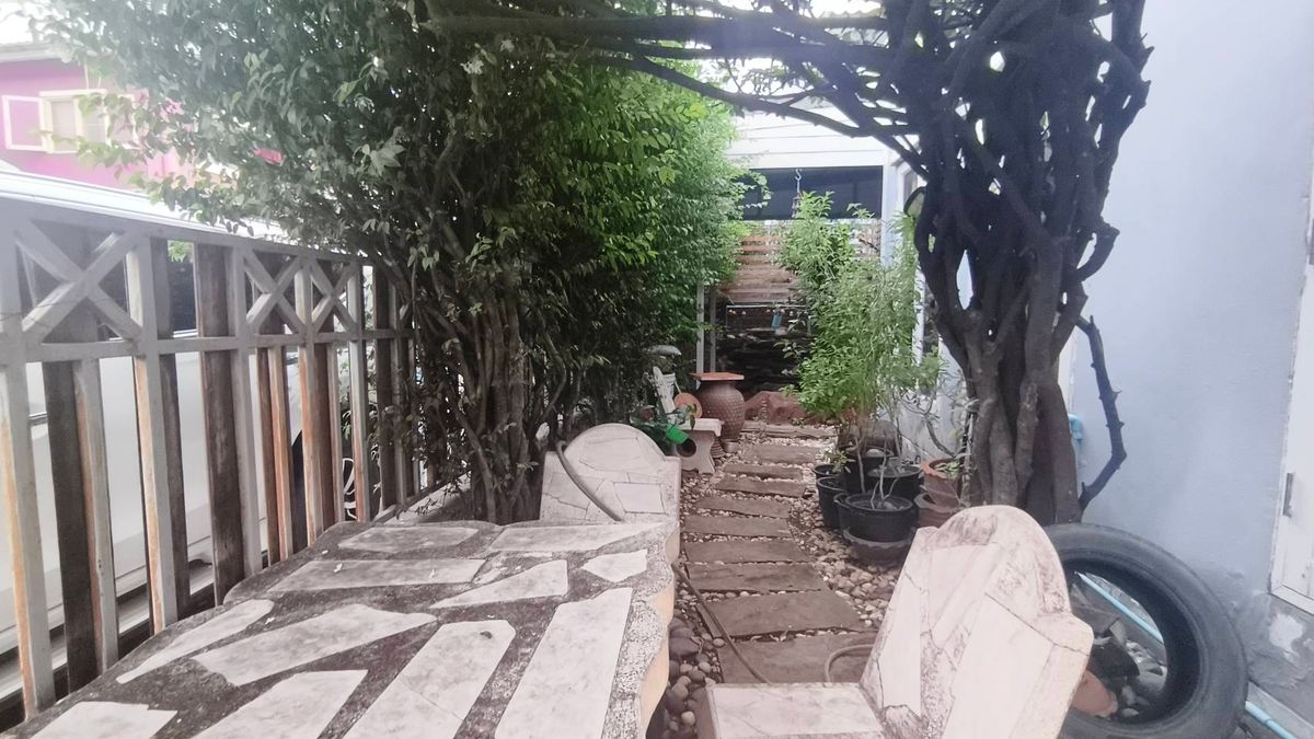 For SaleTownhomePathum Thani,Rangsit, Thammasat : Corner townhouse, large area with koi pond, can park up to 4 cars.