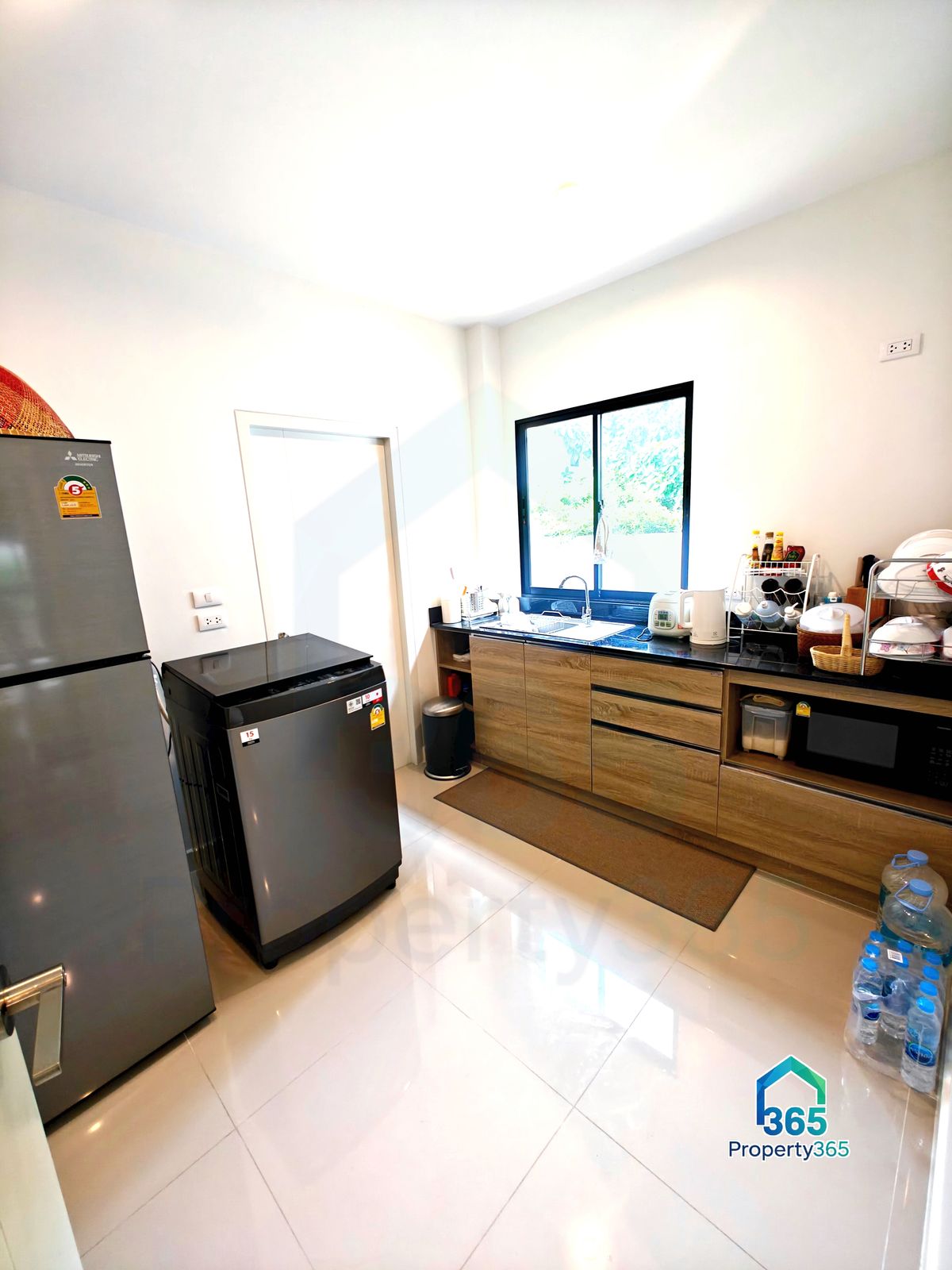 HousePathum Thani,Rangsit, Thammasat : Mitti Lamlukka Klong 6 (Sammakorn) Serene Detached House, 3rd House (from security post), a house in the first soi of the village.