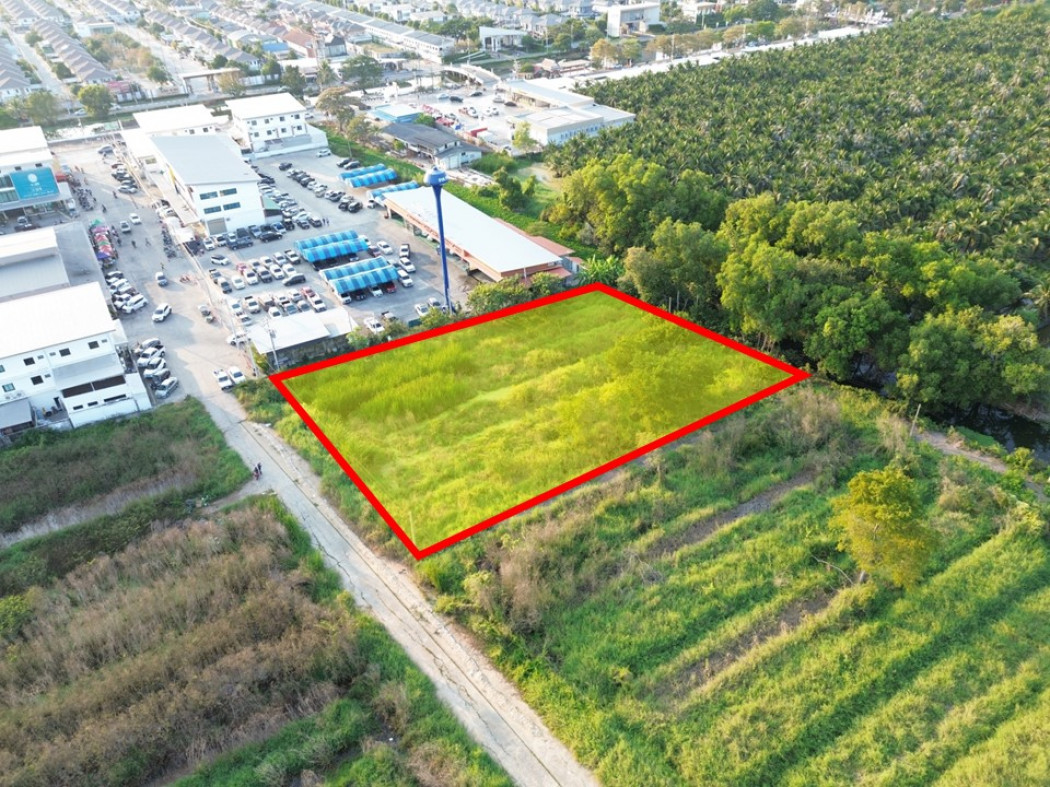 For SaleLandPathum Thani,Rangsit, Thammasat : Land for sale behind Khlong Si Muang Mai Market, over 2 rai, excellent location, suitable for a shop or warehouse. KK