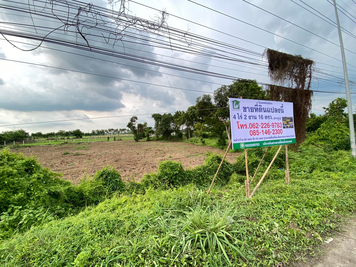 For SaleLandSing Buri : Land for sale in Sing Buri Opposite Phra Non Temple For doing business, factory, warehouse, hotel, 88 meters wide, 83 meters deep Next to Highway 3032