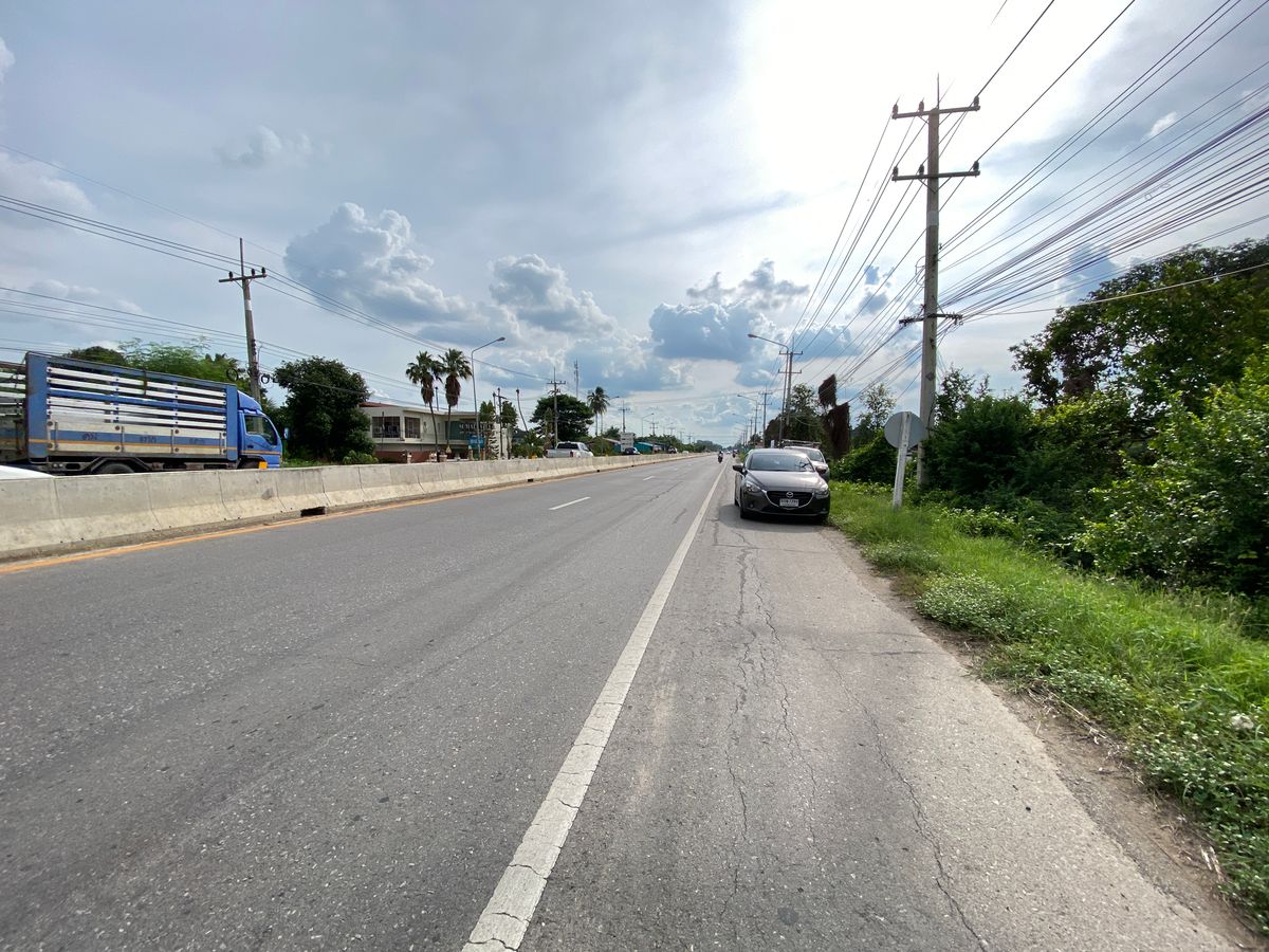 For SaleLandSing Buri : Land for sale in Sing Buri Opposite Phra Non Temple For doing business, factory, warehouse, hotel, 88 meters wide, 83 meters deep Next to Highway 3032