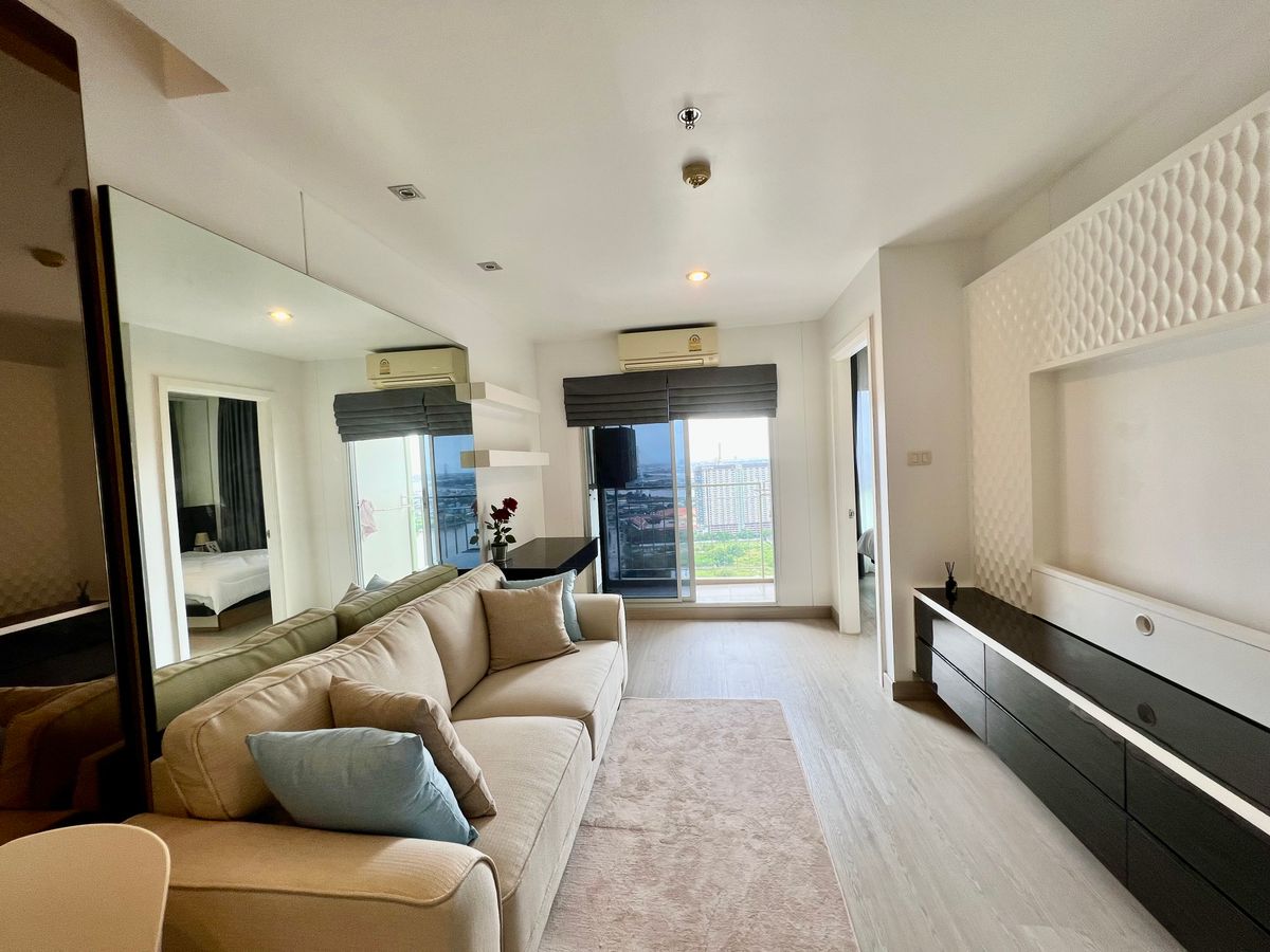 For SaleCondoRama3 (Riverside),Satupadit : For Sale: Lumpini Park Riverside Rama 3 – Corner Unit with Stunning River View  Experience riverside living along the Chao Phraya River at Rama 3. A beautifully designed corner unit with luxury built-in furnishings, perfect for both living and investment.