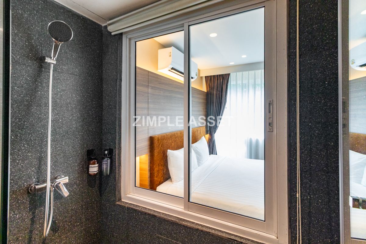 For RentSukhumvit, Asoke, Thonglor : Line ID: @zimple_asset Serviced Apartment in Thonglor, Newly renovated and fully furnished, featuring a rooftop swimming pool with city views. Conveniently located near BTS Thonglor.