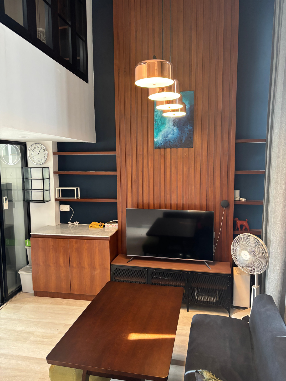 Two-story room, separated from the second floor, has a work zone, dishwasher, oven, and balcony with plants. Washing machine/dryer Loading...