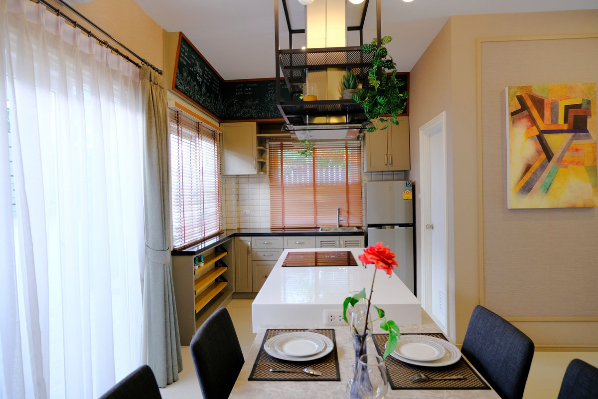 For SaleTownhomePathum Thani,Rangsit, Thammasat : 95360 - The most beautiful in the village, sample house, fully decorated, 2-story townhouse, corner plot, good location, zone in front of the project. Grandville University Pathum Thani-Sai Nai