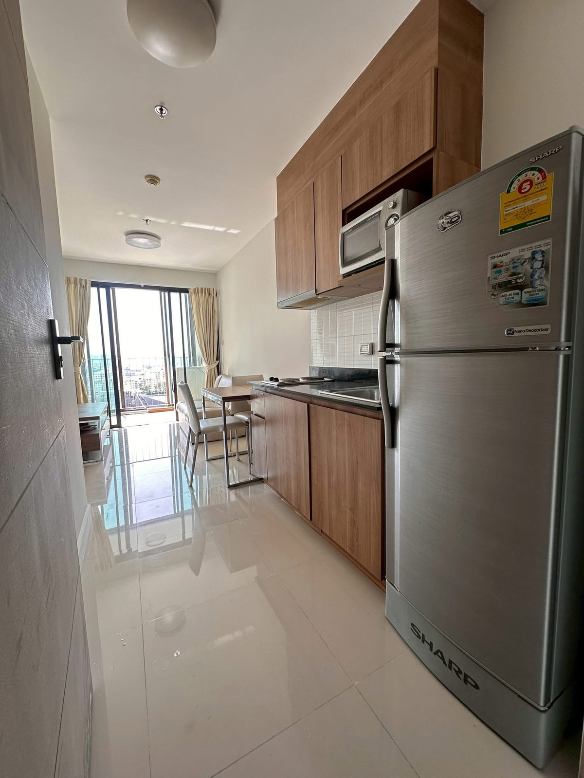 For SaleCondoLadprao, Central Ladprao : Urgent Sale ✨ IDEO Ladprao 5 ✨ South-facing, good ventilation, swimming pool view, city view, Baiyoke Tower visible, near Ladprao Intersection.