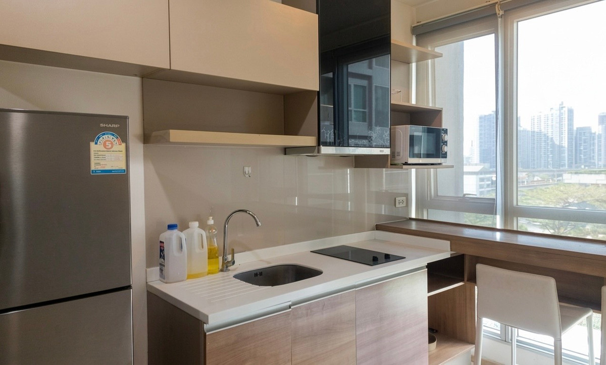 For RentCondoOnnut, Udomsuk : Rhythm Sukhumvit 50 Condo for Rent 🌤️ Open city view, unblocked and airy ☕ Cozy corner to enjoy the view with your coffee🚆 Close to BTS On Nut