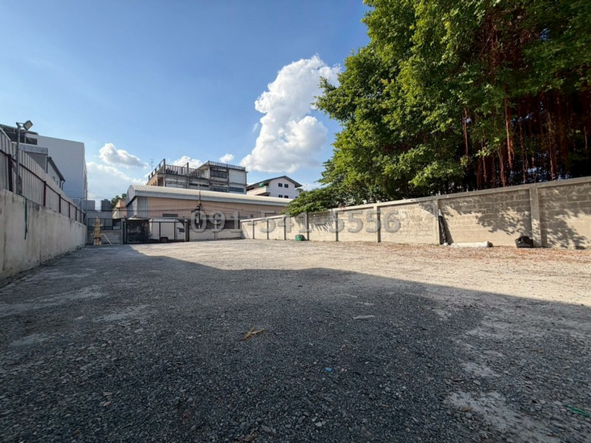 For SaleLandOnnut, Udomsuk : Empty land for sale, 100 square wah, along the road, Soi On Nut 69, with rental income, already filled in, clear boundary lines. With steel door Used as a parking lot