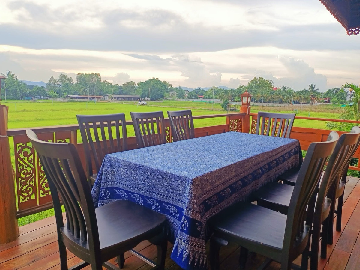 For SaleHousePhrae : Old teak houses for sale, large and small. Complete with train carriages On land in a prime location, Phrae Province, over 8 rai, next to the road along the irrigation canal, mountain view, cool and shady atmosphere mixed with the scent of nature in every