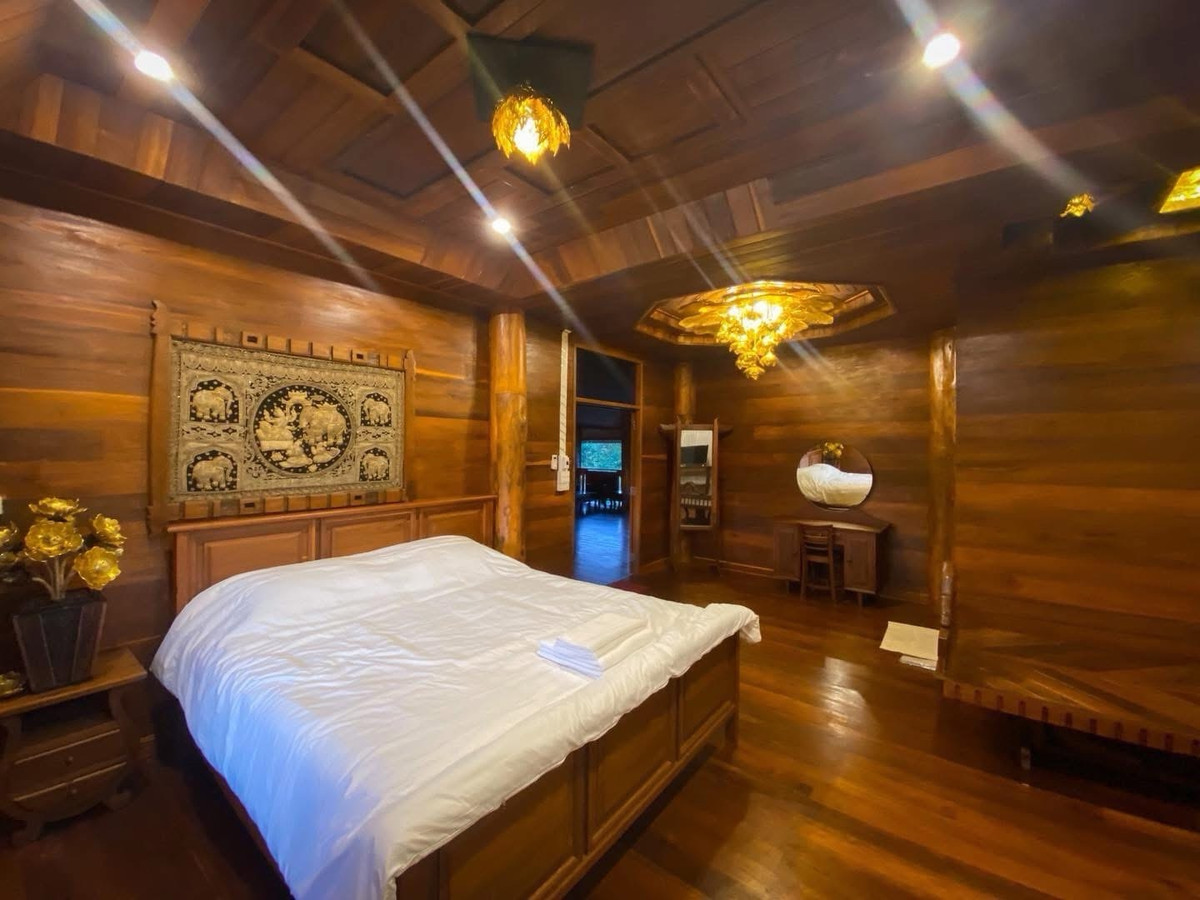 For SaleHousePhrae : Old teak houses for sale, large and small. Complete with train carriages On land in a prime location, Phrae Province, over 8 rai, next to the road along the irrigation canal, mountain view, cool and shady atmosphere mixed with the scent of nature in every