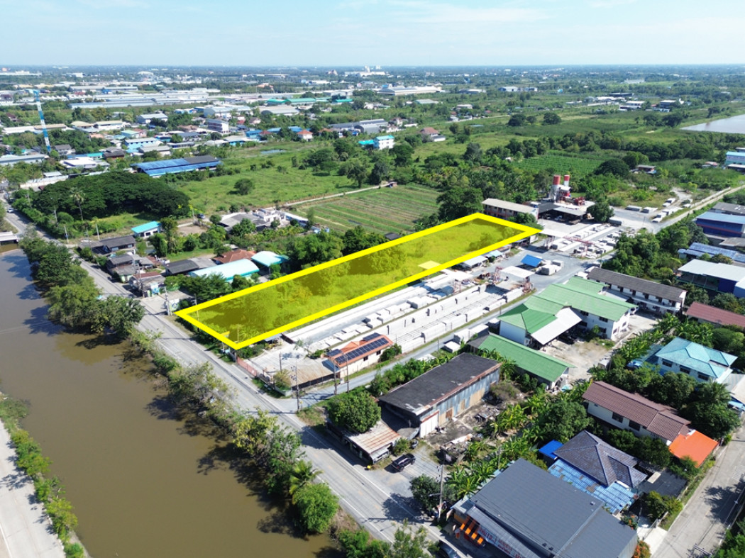 For SaleLandPathum Thani,Rangsit, Thammasat : Prime 3-Rai Land in Khlong Luang, Pathum Thani – Pink Zone, Road Frontage, Ideal for Warehouse, Commercial or Residential Projects