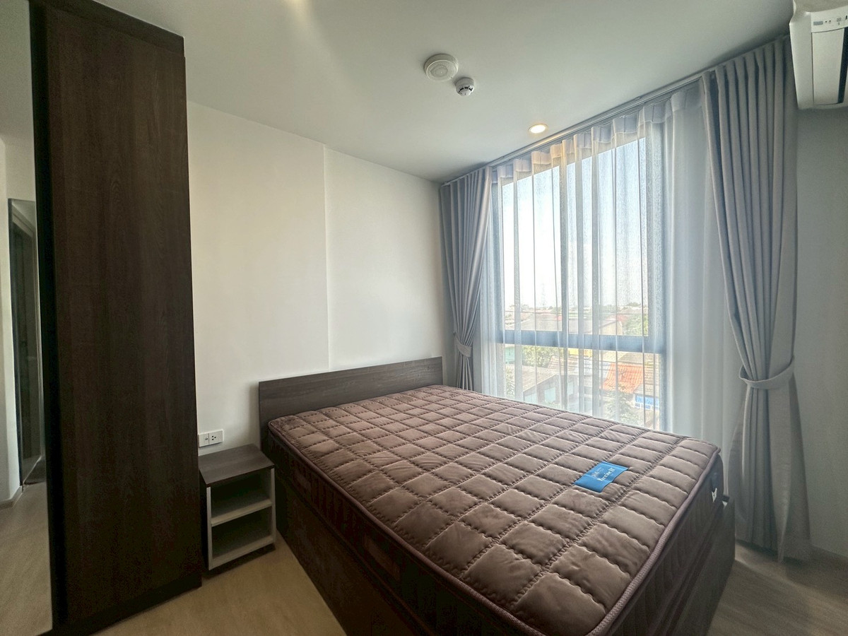 For RentCondoPathum Thani,Rangsit, Thammasat : NUE CROSS Khu Khot, good price 8,500/month, next to BTS Khu Khot.