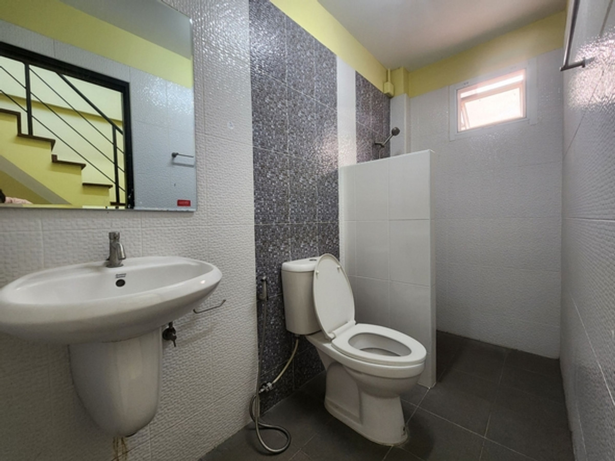 For RentShop HouseEakachai, Bang Bon : Commercial building for rent, 3 floors, front glass partition, room divider, Ekachai Road, near Wat Pho Chae. Suitable for a home office, wide road, easy parking.