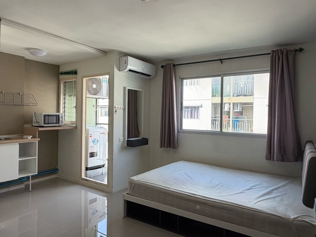 For RentCondoPathum Thani,Rangsit, Thammasat : Tiled room There is a washing machine.