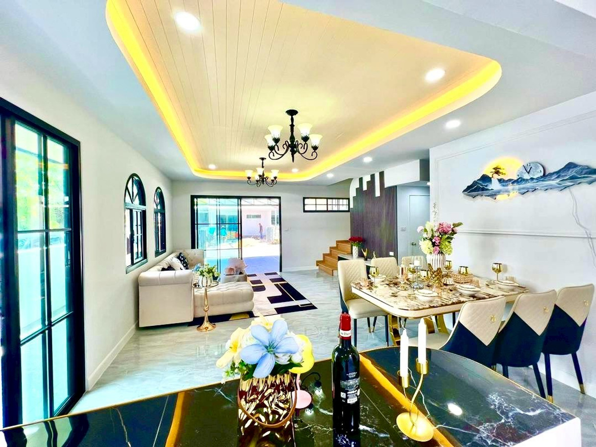 For SaleTownhomePathum Thani,Rangsit, Thammasat : 2-story townhome for sale, The Trust Town Village, Wongwaen - Lam Luk Ka, along Khlong 6, Soi 28, area 27.8 square wah, 3 bedrooms, Bueng Kham Proi Subdistrict, Lam Luk Ka District, Pathum Thani Province.
