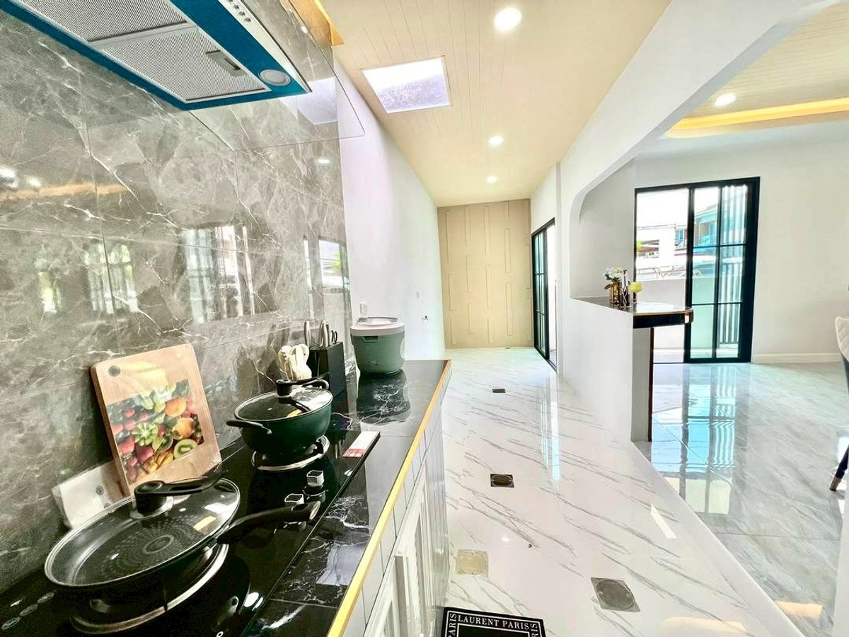 For SaleTownhomePathum Thani,Rangsit, Thammasat : 2-story townhome for sale, The Trust Town Village, Wongwaen - Lam Luk Ka, along Khlong 6, Soi 28, area 27.8 square wah, 3 bedrooms, Bueng Kham Proi Subdistrict, Lam Luk Ka District, Pathum Thani Province.