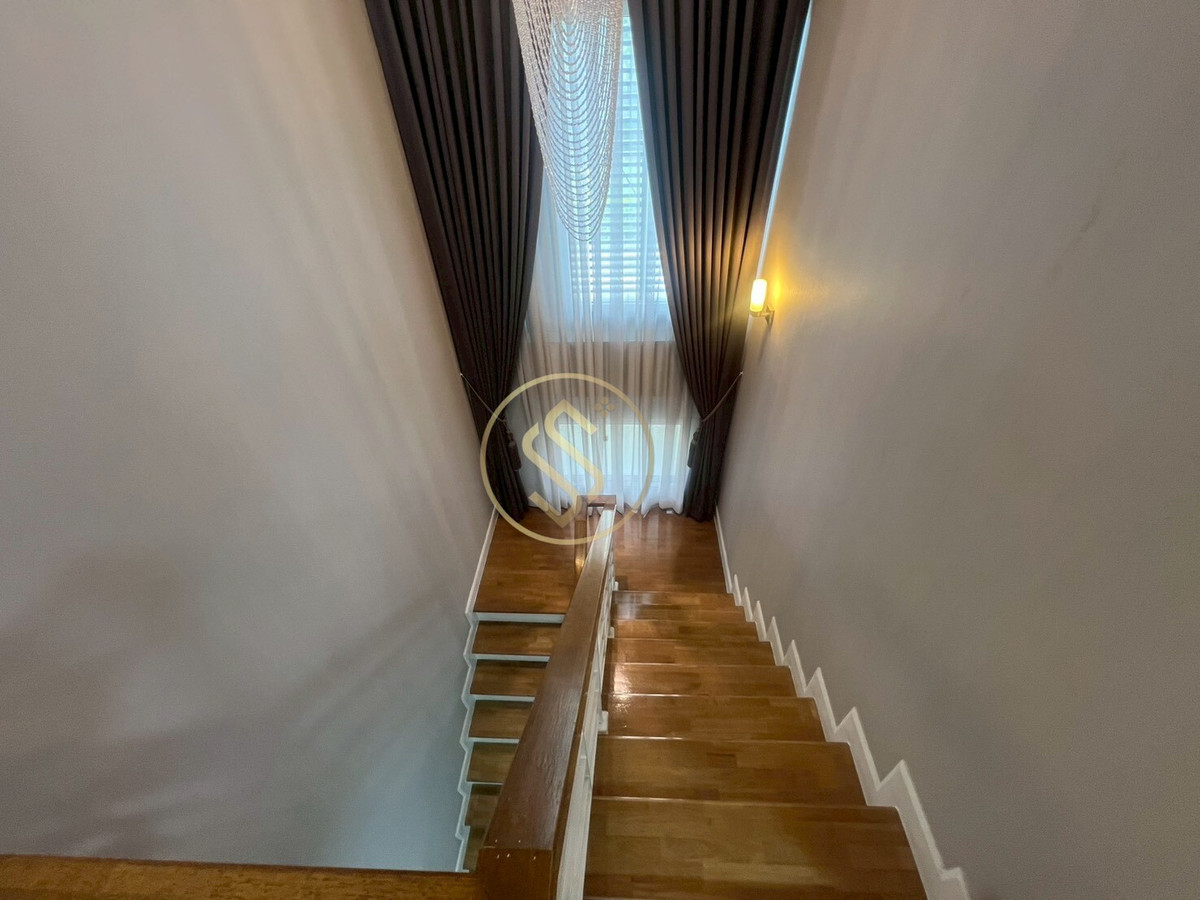 For SaleHouseNonthaburi, Bang Yai, Bangbuathong : Urgent sale, 2-story detached house, The City Ratchaphruek project, Bang Len Subdistrict, Bang Yai District, beautiful house, back side, in front of a shady garden.