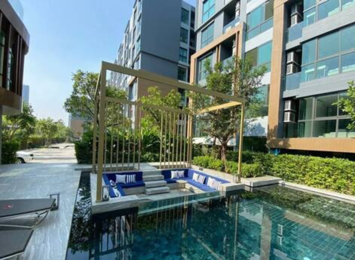 For SaleCondoOnnut, Udomsuk : Sale: The Excel Hideaway Sukhumvit 71  Rear-facing view, Building C next to swimming pool
