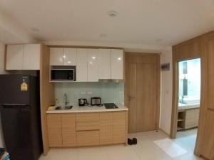 ให้เช่าคอนโดพัทยา บางแสน ชลบุรี สัตหีบ : คอนโดพัทยาให้เช่า ซิตี้ การ์เด้นท์ ทรอปิคาน่า Pool  Access คอนโดพัทยาเหนือ หาดวงศ์อมาตย์ 1ฺ Bed 32.98 ตร.ม. ตกแต่งพร้อมอยู่ ค่าเช่าเดือนละ 13,000 บาท